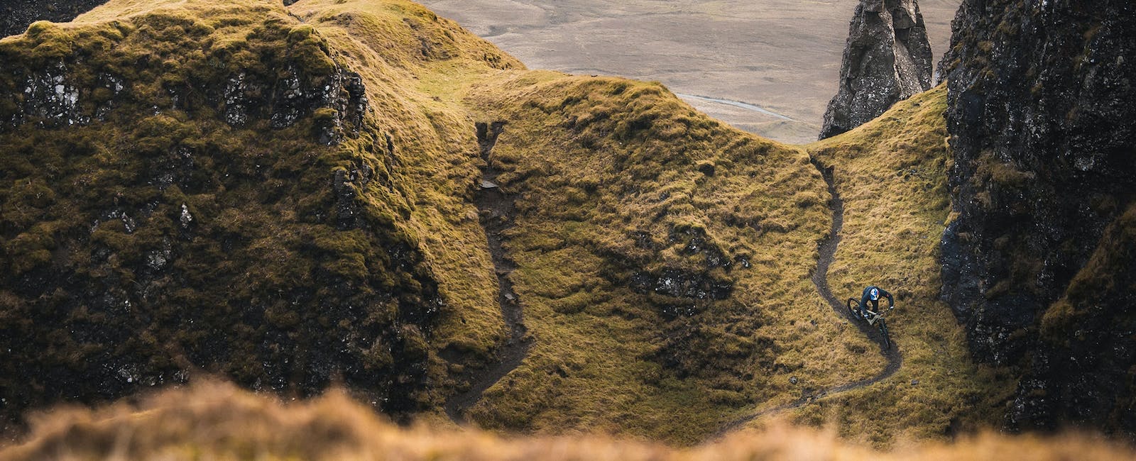 Danny MacAskill riding his Heckler eMTB down a rocky trail