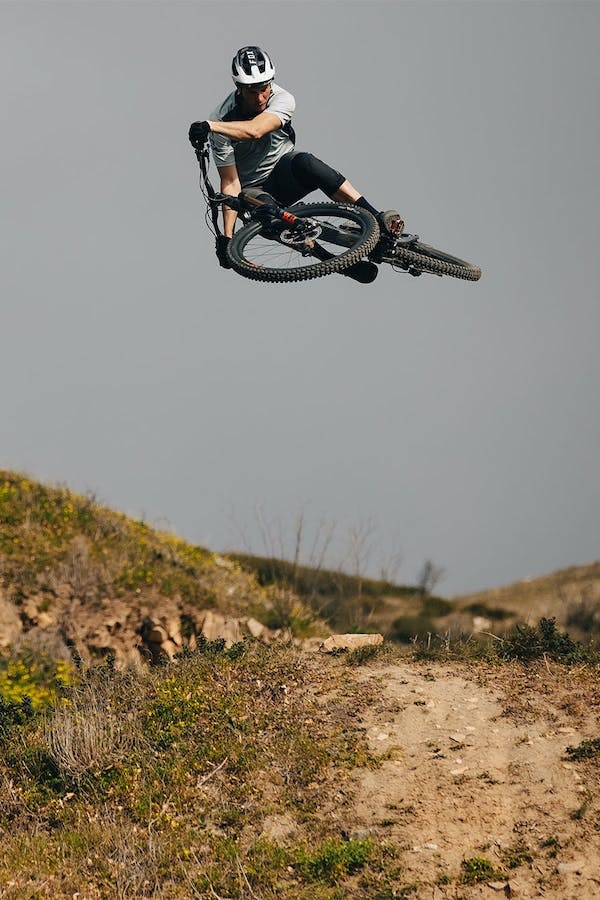 Greg Minnaar jumping on his Santa Cruz Megatower